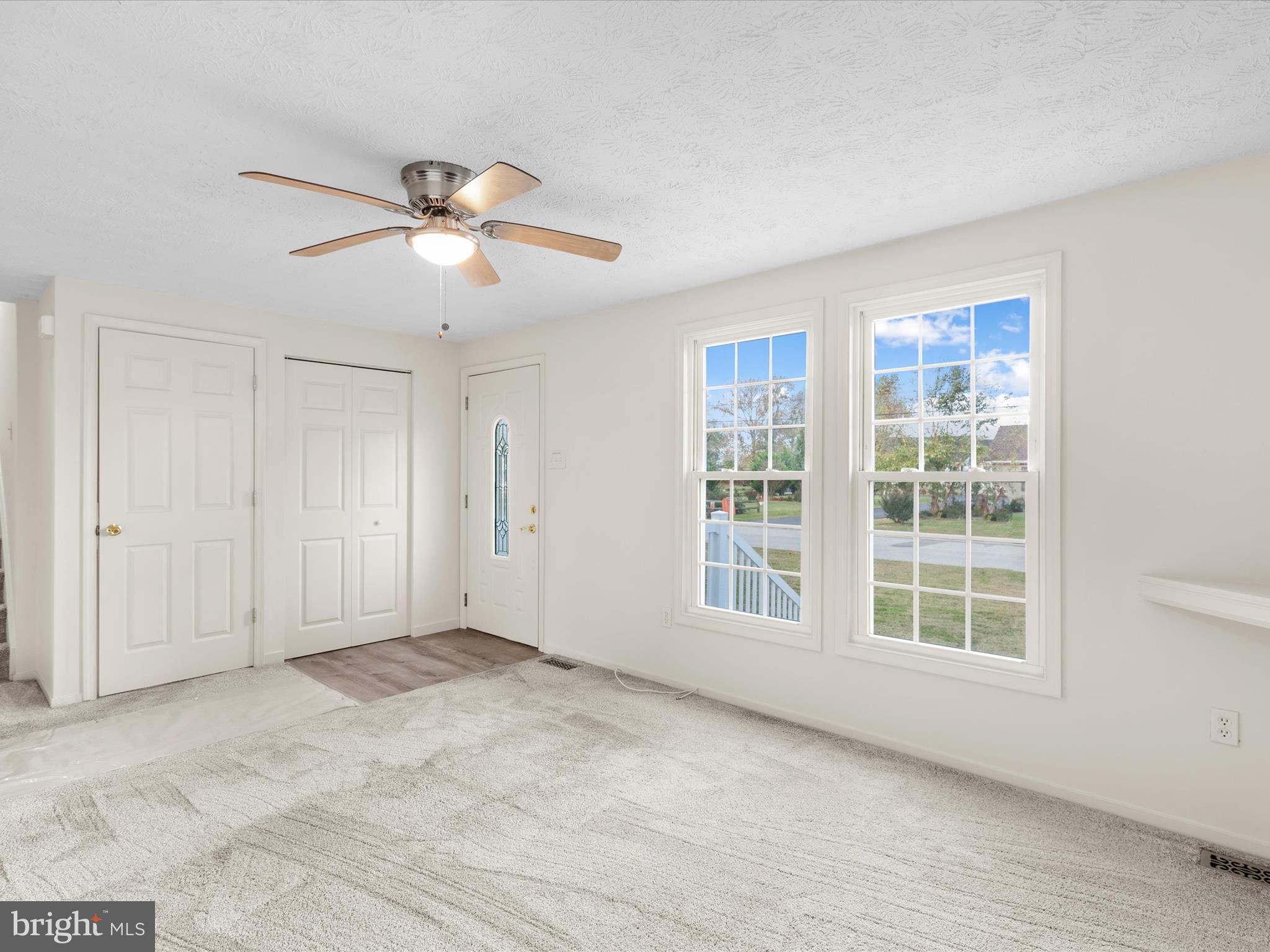 403 West Street Berlin, MD 21811 - Photo 5 of 34 a view of an empty room with a window
