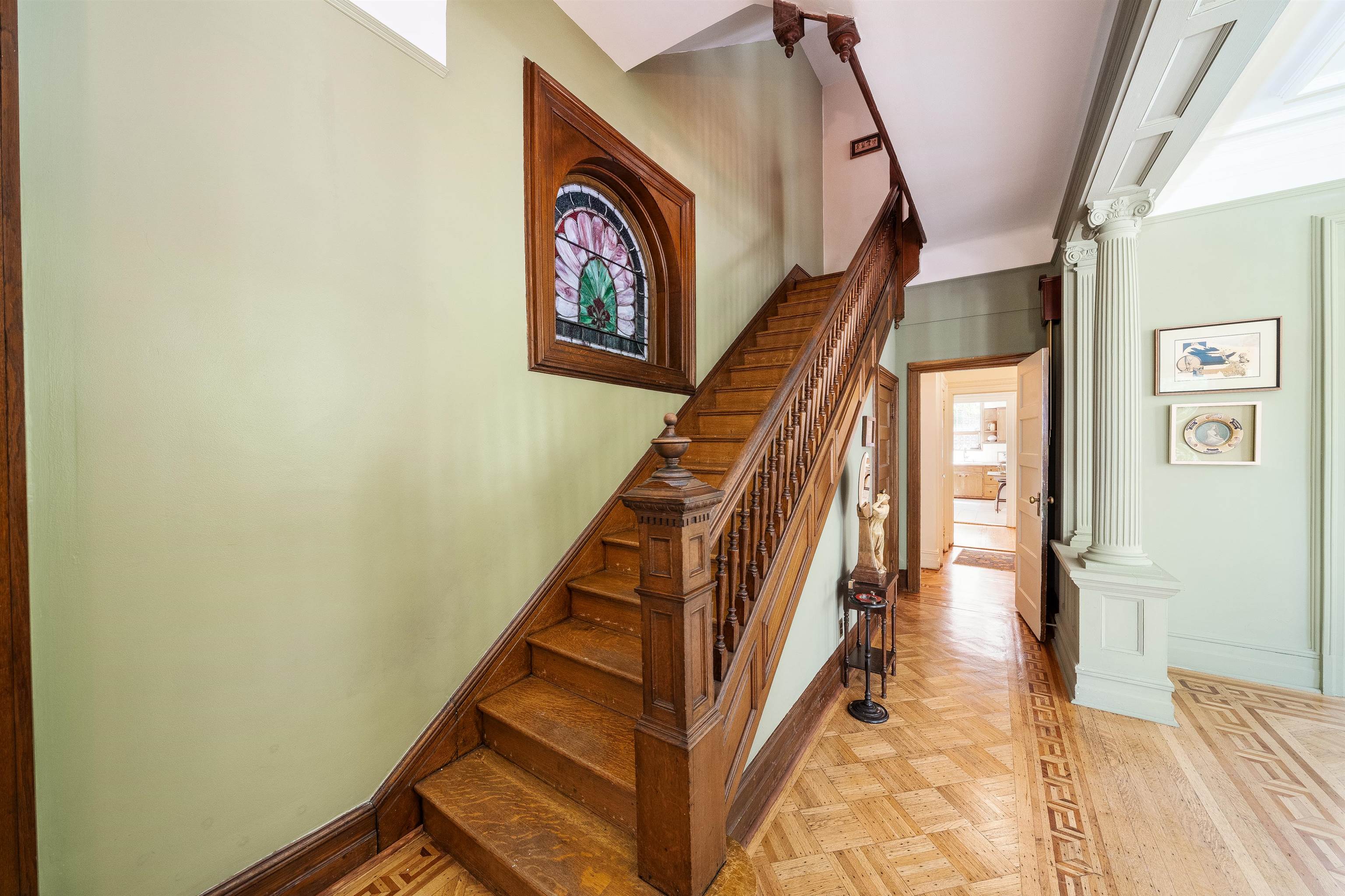 901 Castle Point Terrace Hoboken, NJ 07030 - Photo 12 of 40 a view of staircase with wooden floor and a rug