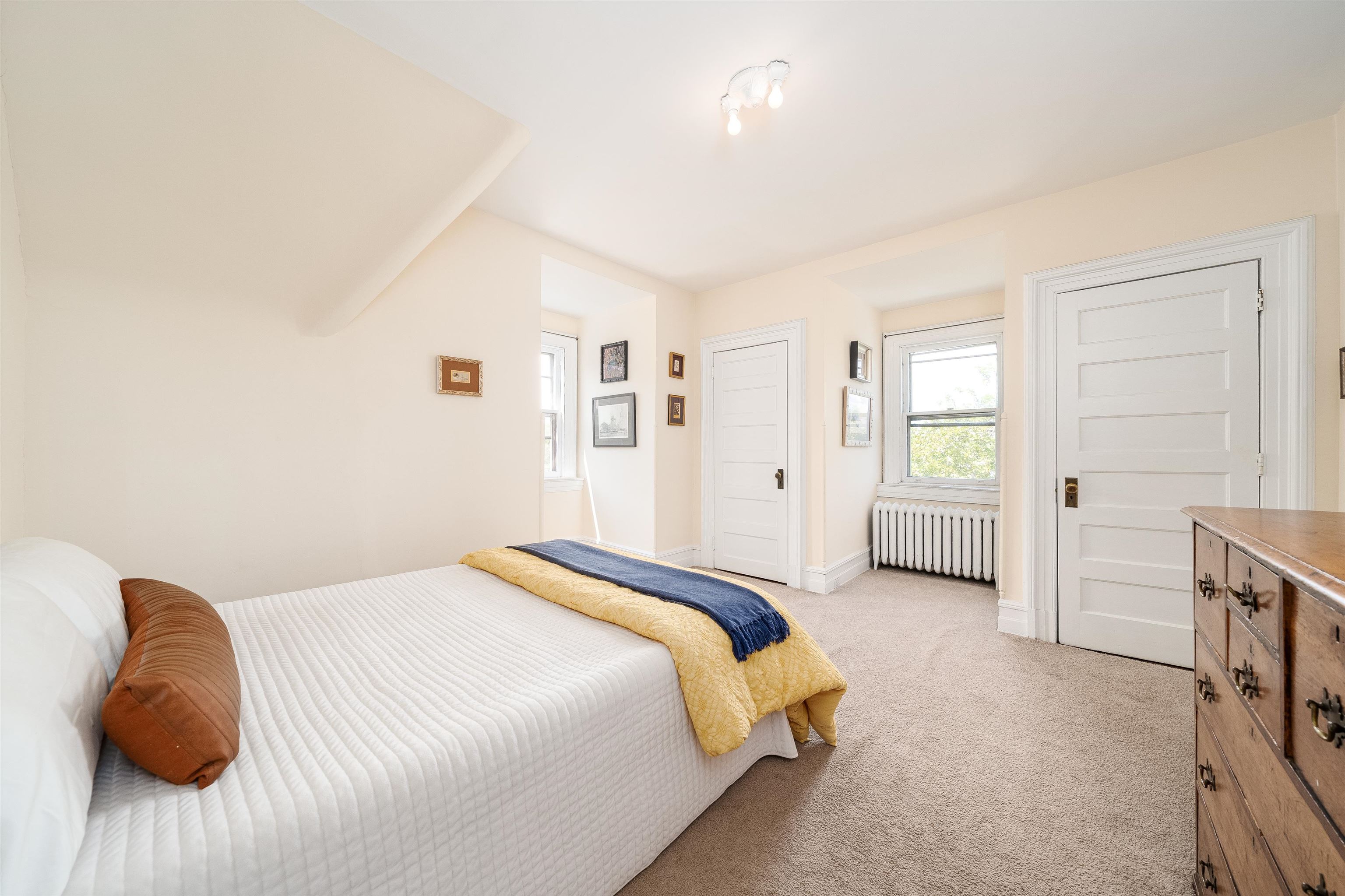 901 Castle Point Terrace Hoboken, NJ 07030 - Photo 21 of 40 a bedroom with a bed and a window