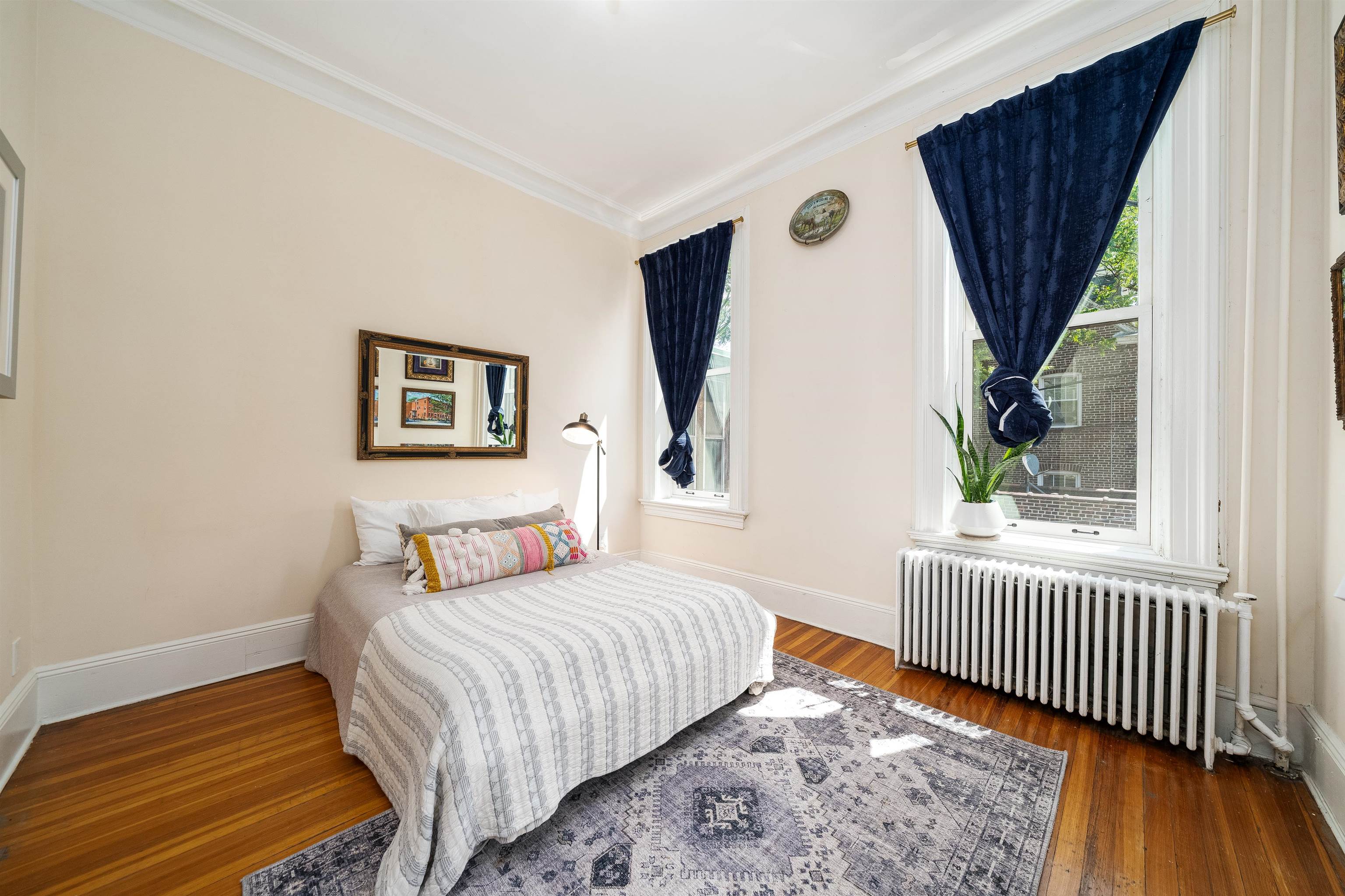 901 Castle Point Terrace Hoboken, NJ 07030 - Photo 23 of 40 a bedroom with a bed and a window