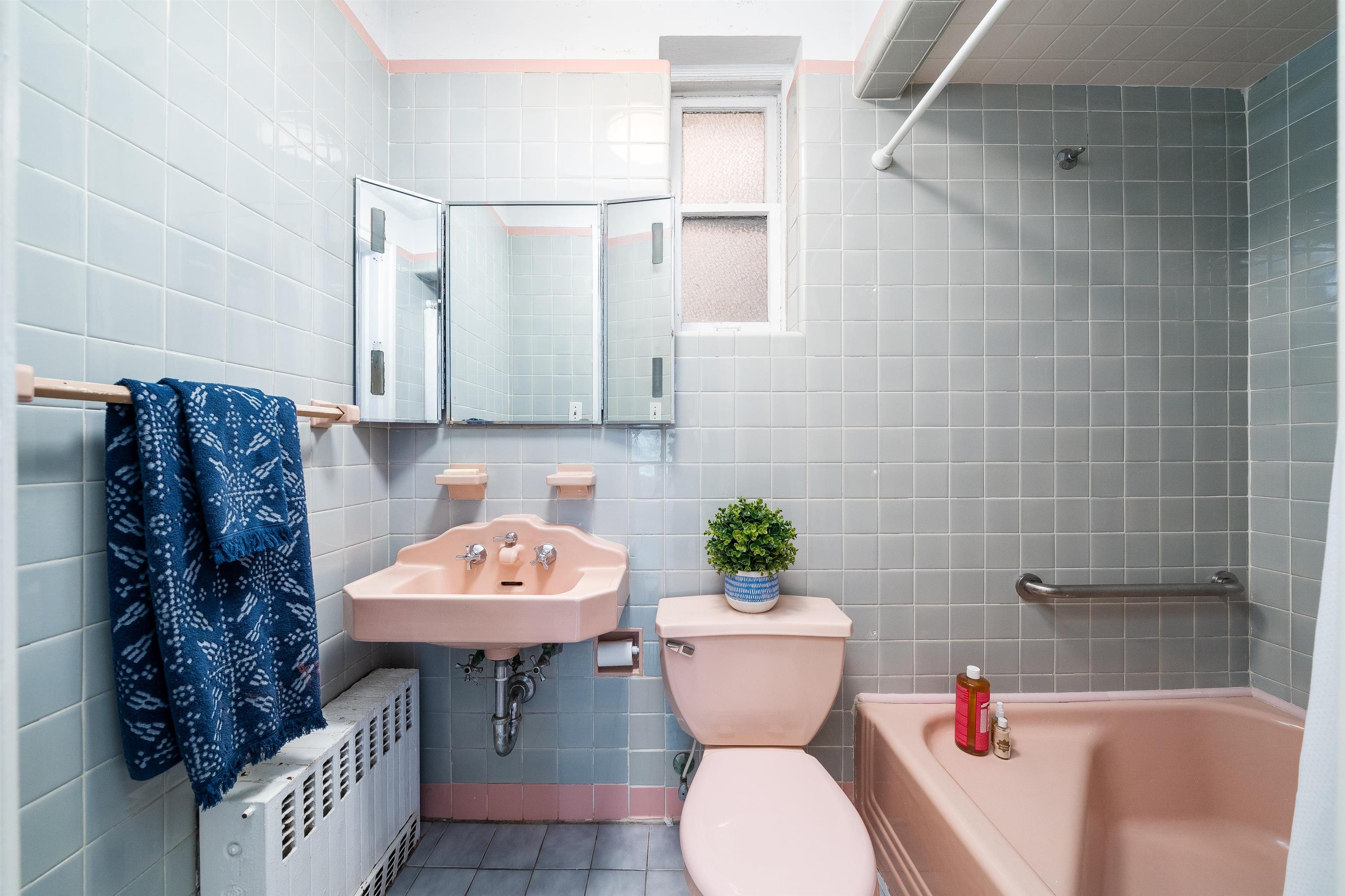 901 Castle Point Terrace Hoboken, NJ 07030 - Photo 24 of 40 a bathroom with a sink toilet and shower