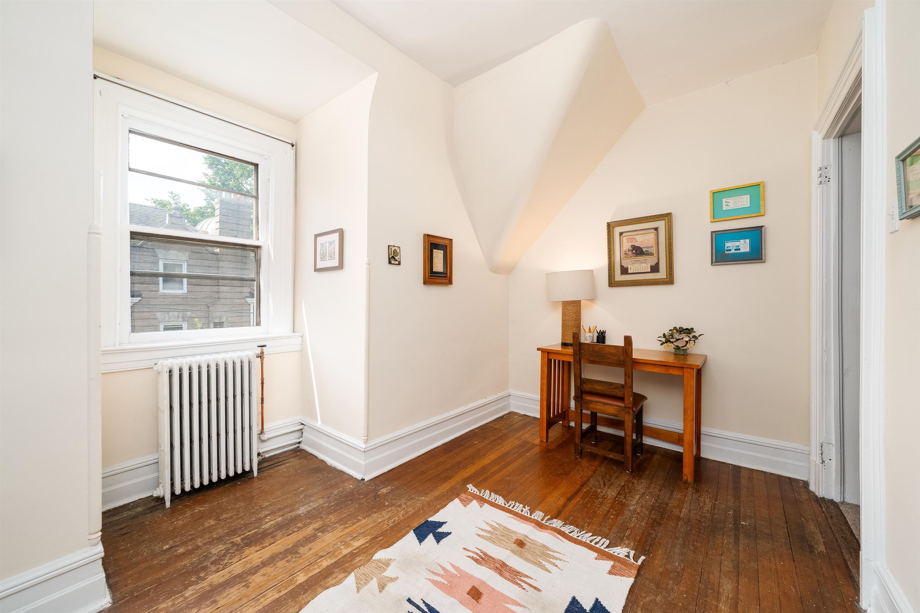 901 Castle Point Terrace Hoboken, NJ 07030 - Photo 26 of 40 a workspace with wooden floor and a window