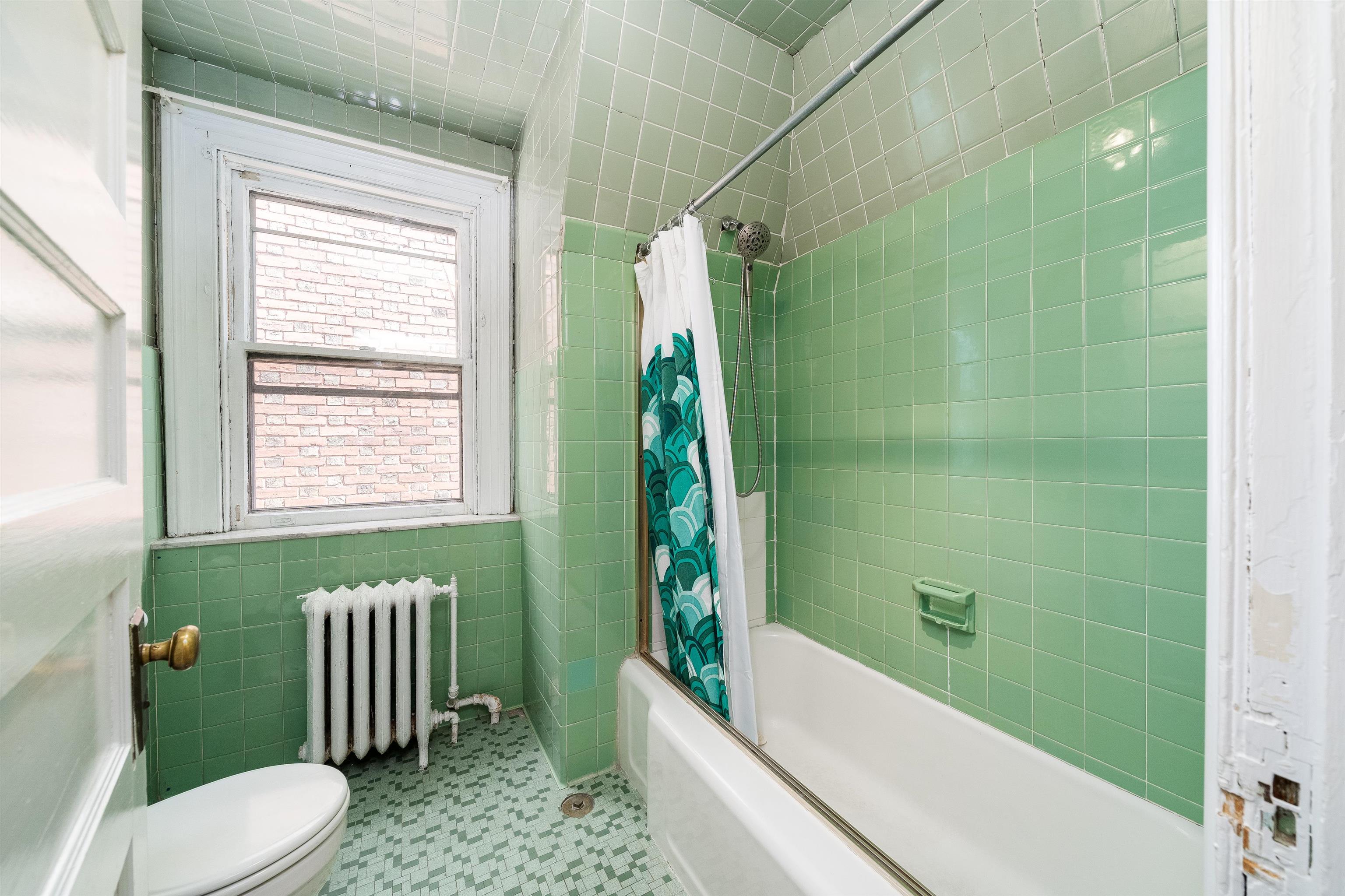 901 Castle Point Terrace Hoboken, NJ 07030 - Photo 33 of 40 a bathroom with a sink toilet and shower