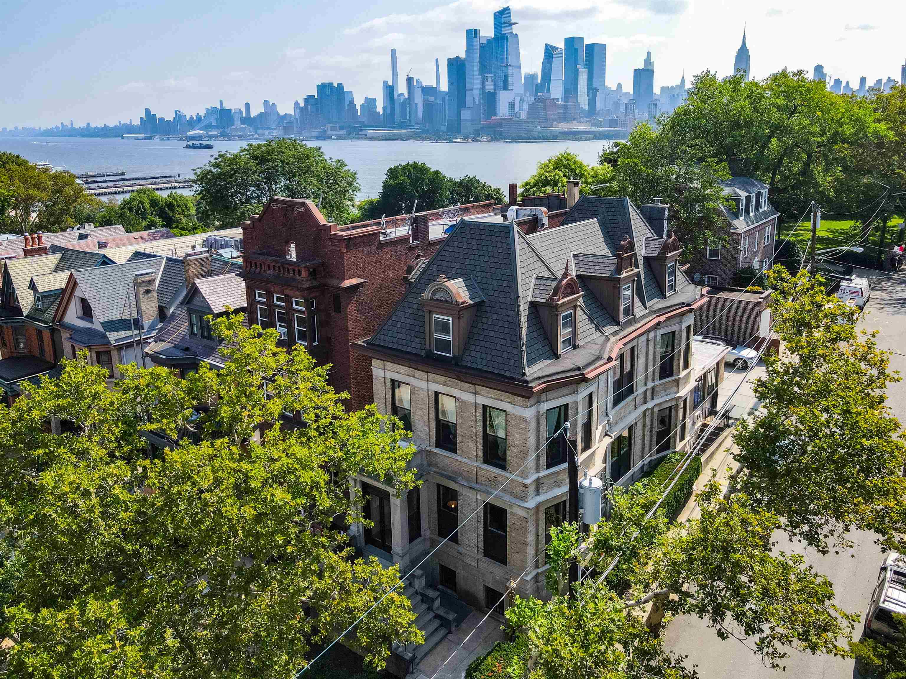 901 Castle Point Terrace Hoboken, NJ 07030 - Photo 36 of 40 an aerial view of multiple houses with a yard