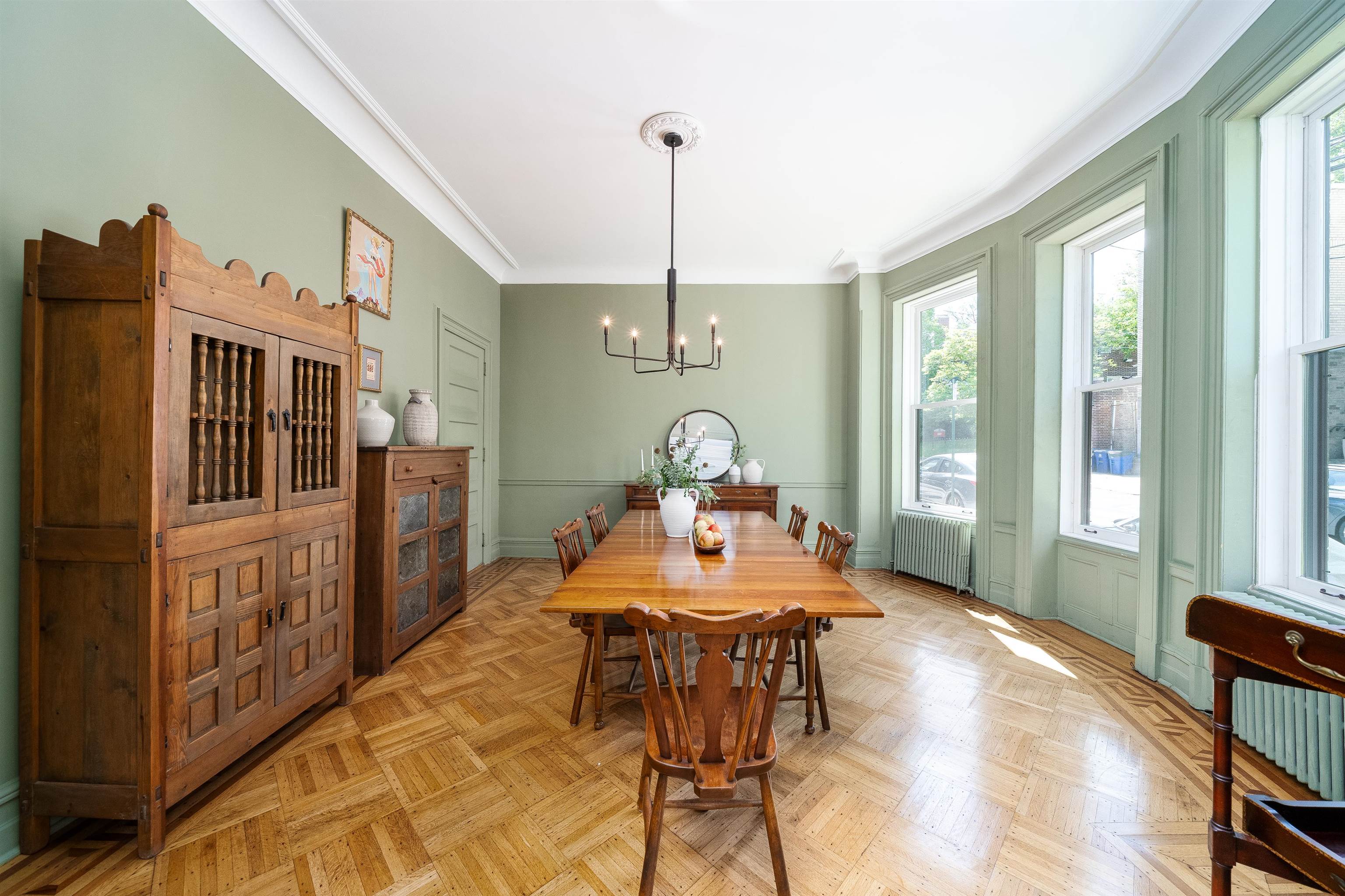 901 Castle Point Terrace Hoboken, NJ 07030 - Photo 7 of 40 a dining room with furniture a chandelier and wooden floor