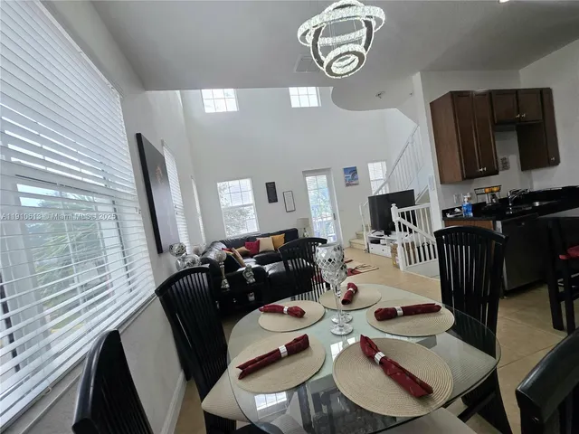 a view of a balcony with furniture