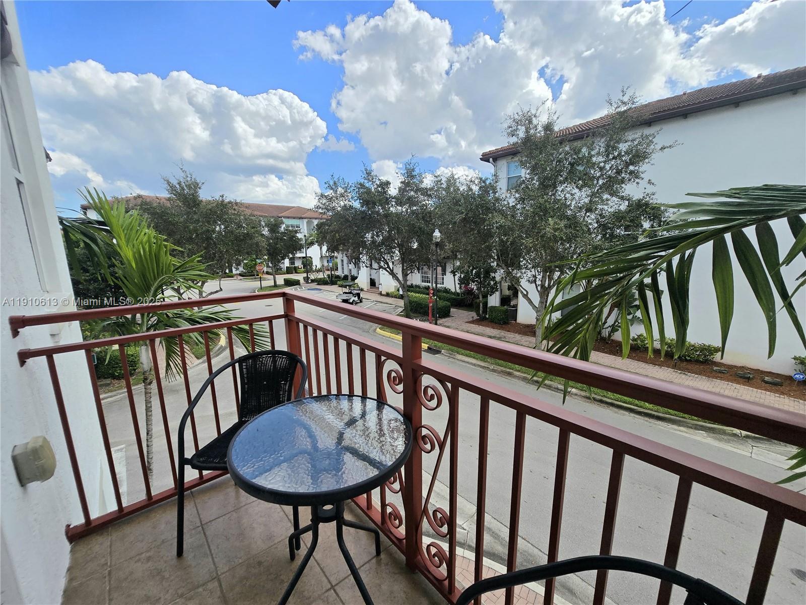 11938 Southwest 26th Court Miramar, FL 33025 - Photo 28 of 62 a view of a balcony with furniture