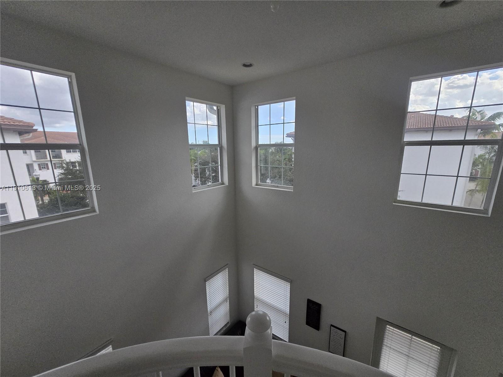 11938 Southwest 26th Court Miramar, FL 33025 - Photo 30 of 62 a view of a room that has a window and wooden floor