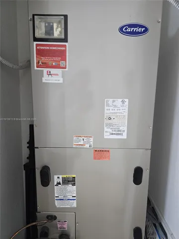 a view of a street with a building in the background