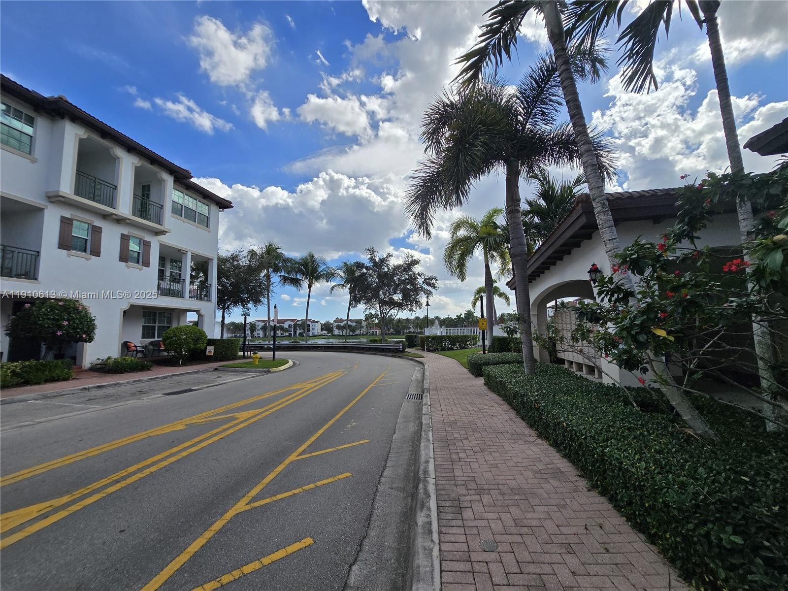 11938 Southwest 26th Court Miramar, FL 33025 - Photo 46 of 62 a view of a street with a building in the background
