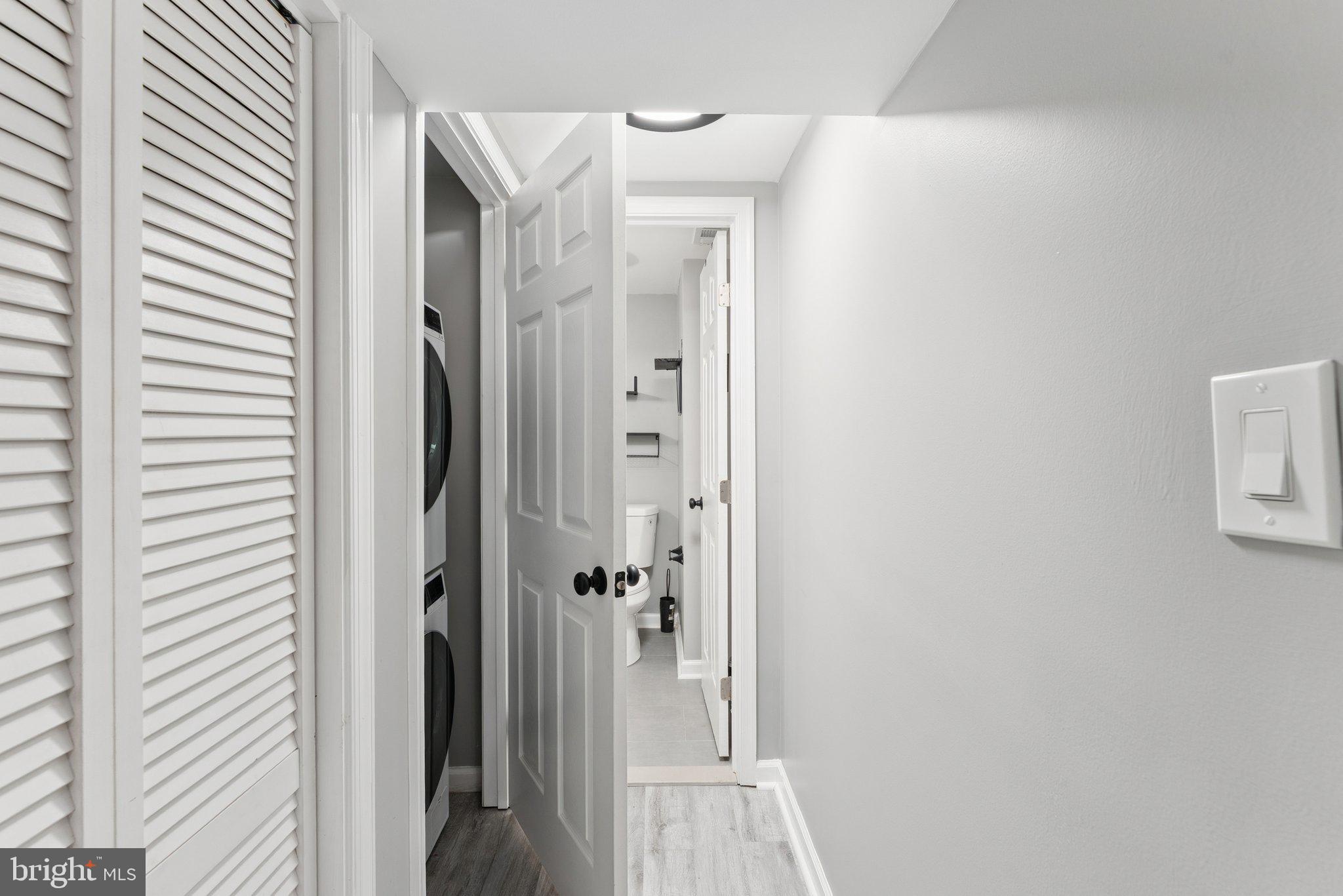 1525 Morris Road Southeast Washington, DC 20020 - Photo 22 of 30 Basement hallway to laundry/bathroom