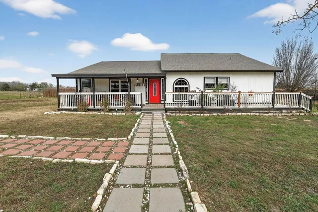 a front view of house with yard