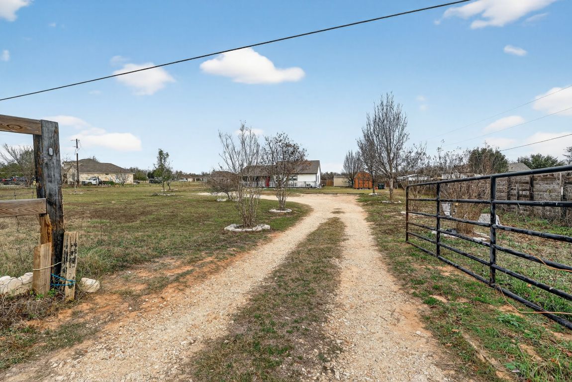 174 Monroe Lane Elgin, TX 78621 - Photo 20 of 21 a view of a street with outdoor space