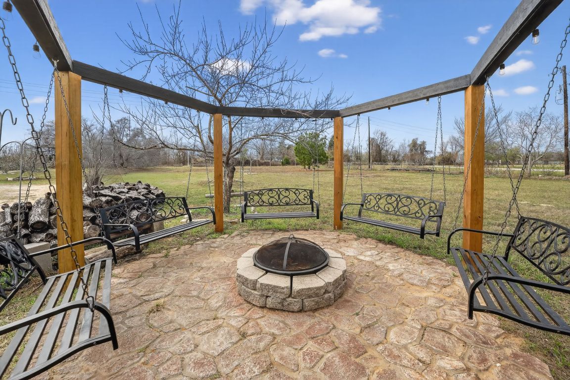 174 Monroe Lane Elgin, TX 78621 - Photo 21 of 21 a room with furniture and large windows