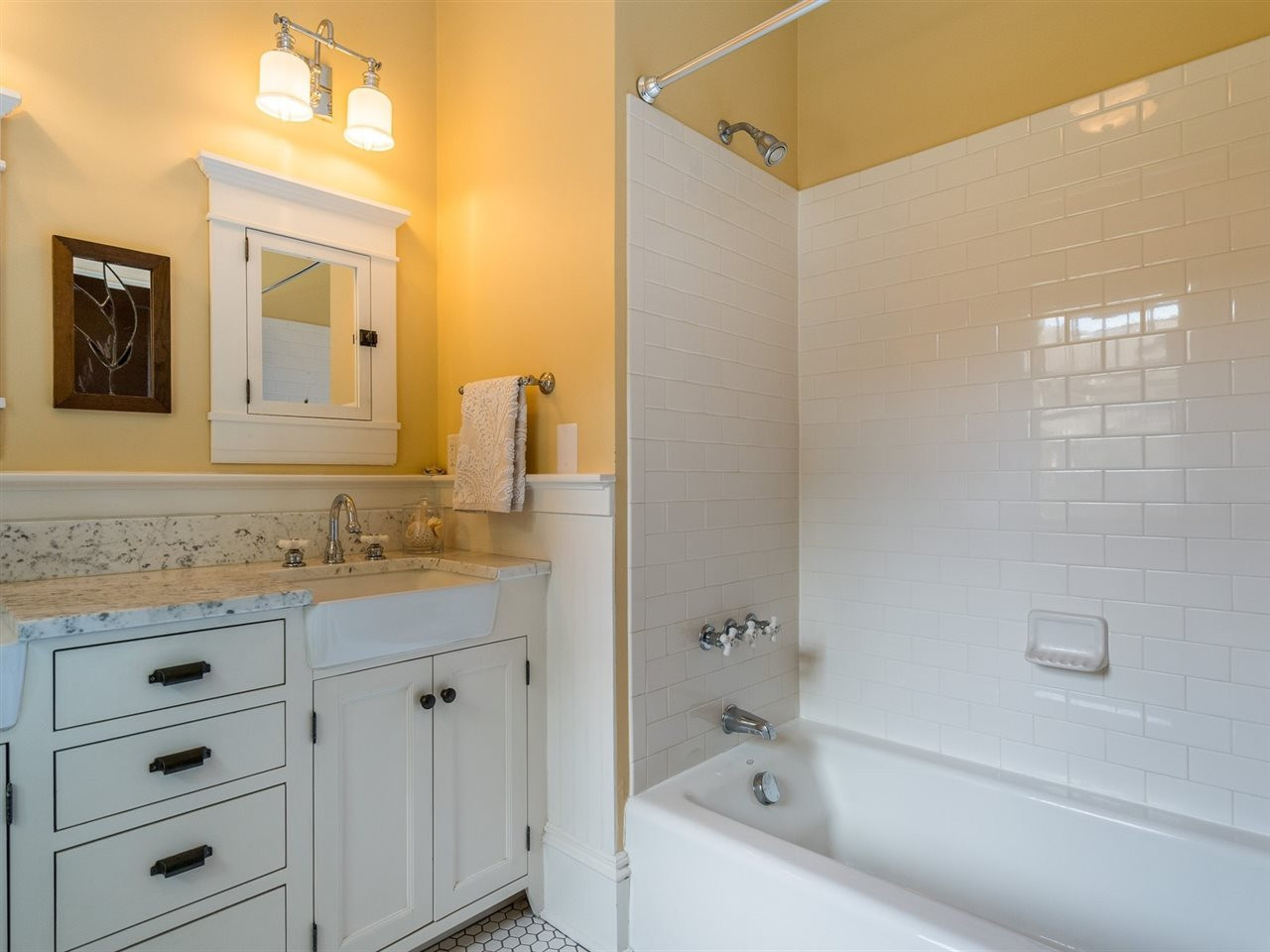 1806 Wills Avenue Raleigh, NC 27608 - Photo 20 of 28 The tub/shower completes the package in this well-designed master suite. Master Suite