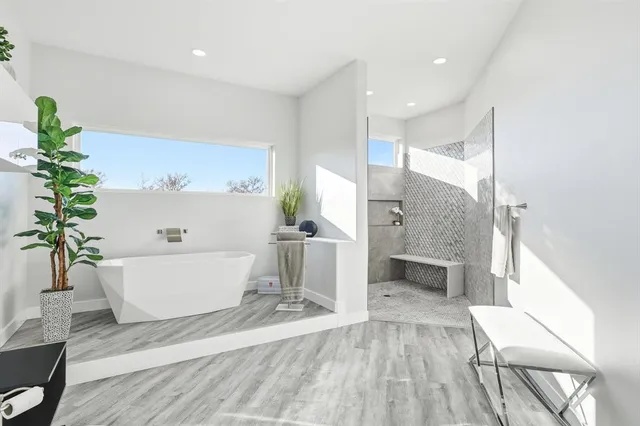 a kitchen with stainless steel appliances a stove a sink and a refrigerator