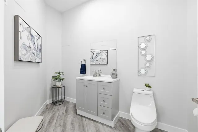 a living room with furniture and large window