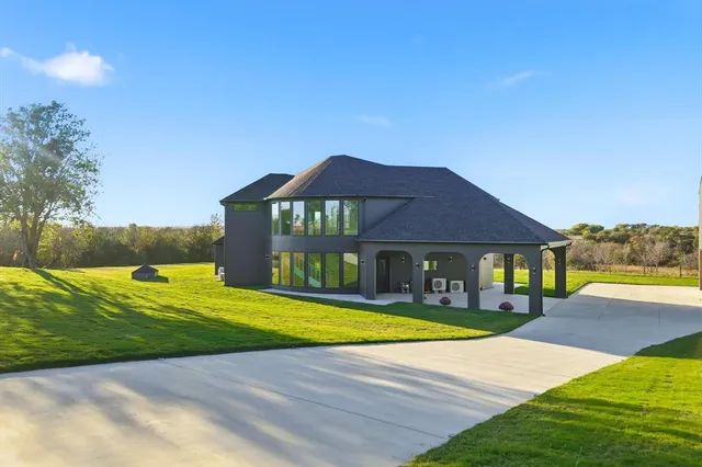 a view of a house with a swimming pool