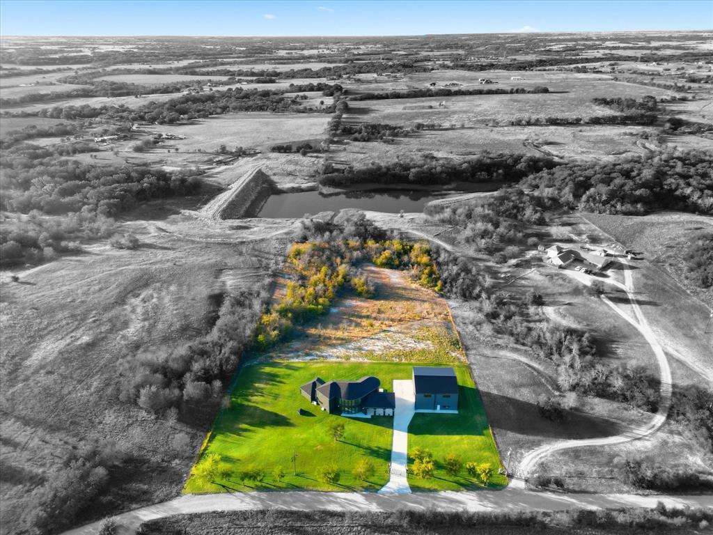 145 ROCK Court Decatur, TX 76234 - Photo 39 of 40 a view of a yard with an ocean