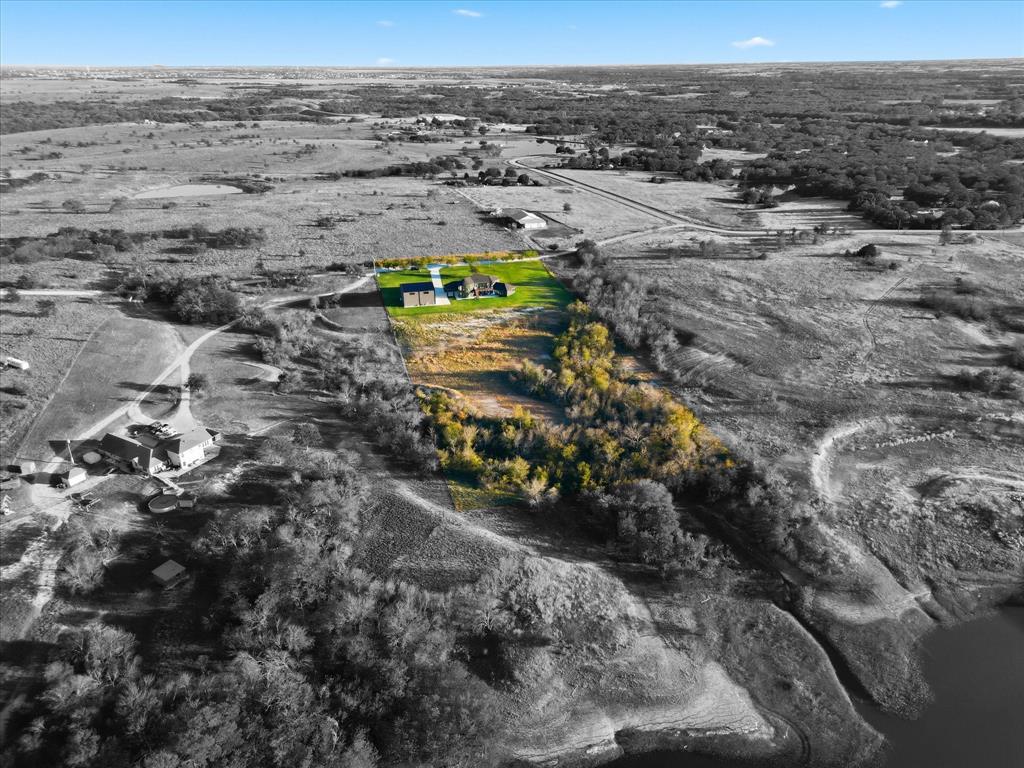 145 ROCK Court Decatur, TX 76234 - Photo 40 of 40 a view of beach and yard