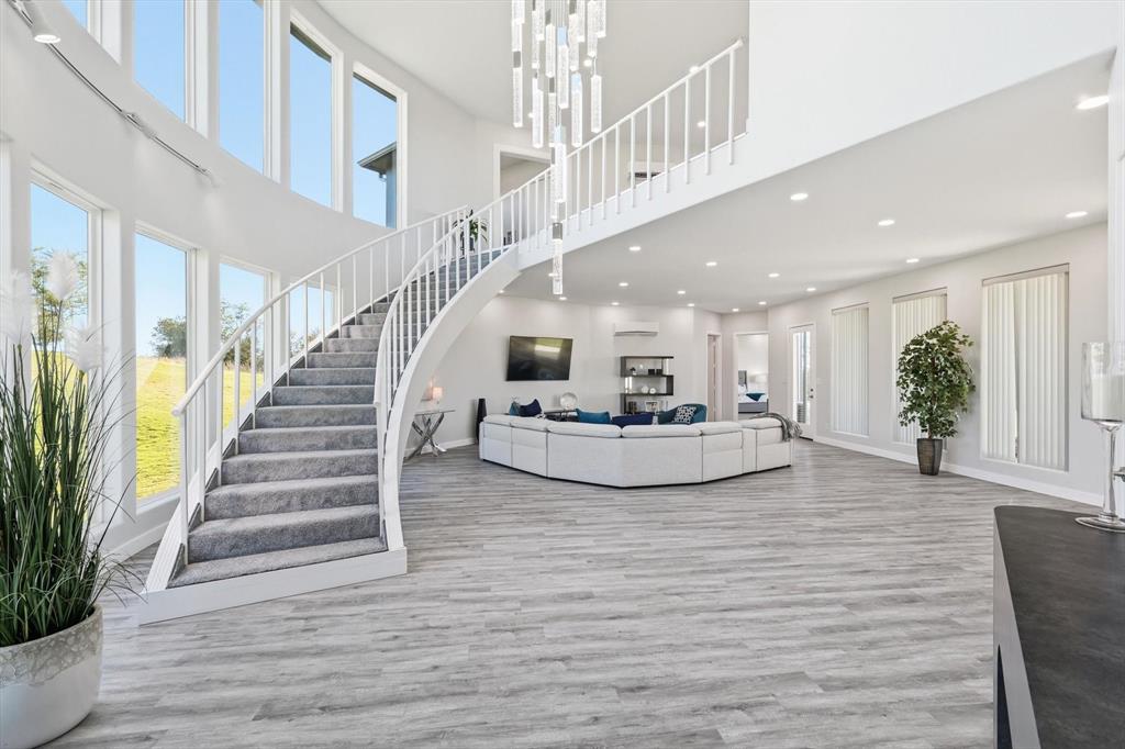 145 ROCK Court Decatur, TX 76234 - Photo 5 of 40 a view of entryway and hall with wooden floor
