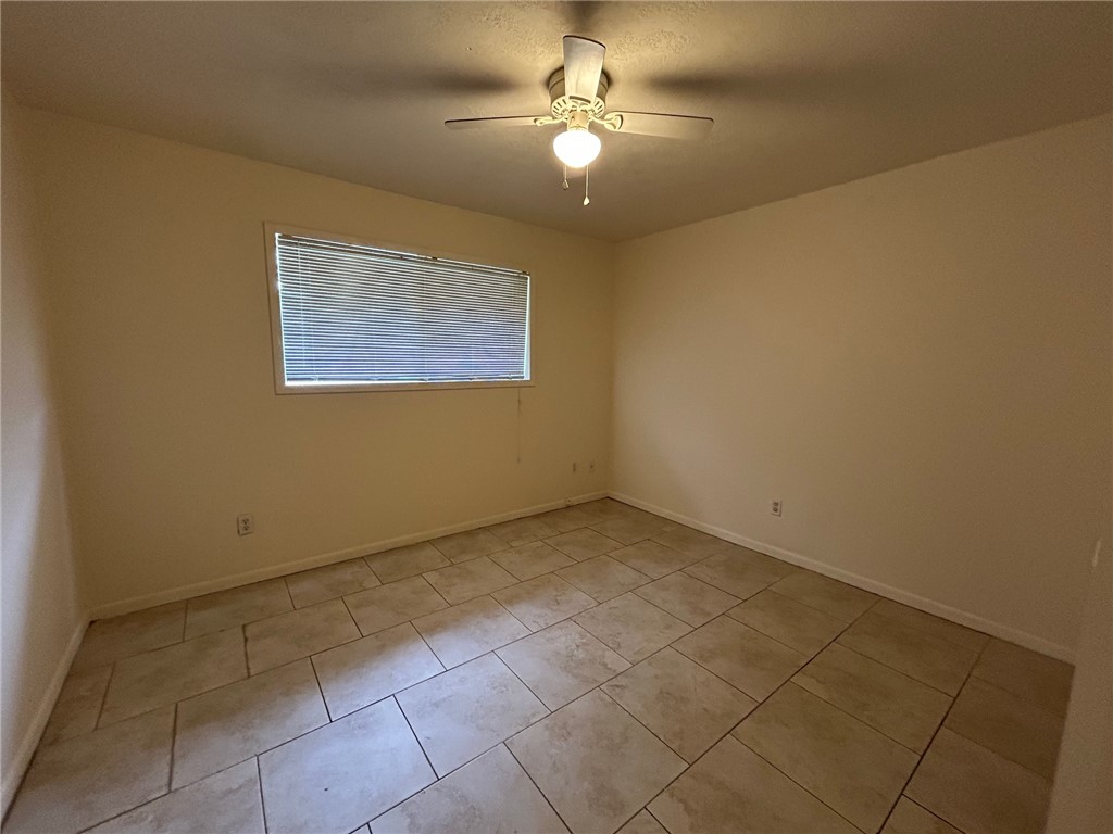 1913 Pine Tree Drive, Unit B Bryan, TX 77802 - Photo 10 of 13 a view of an empty room
