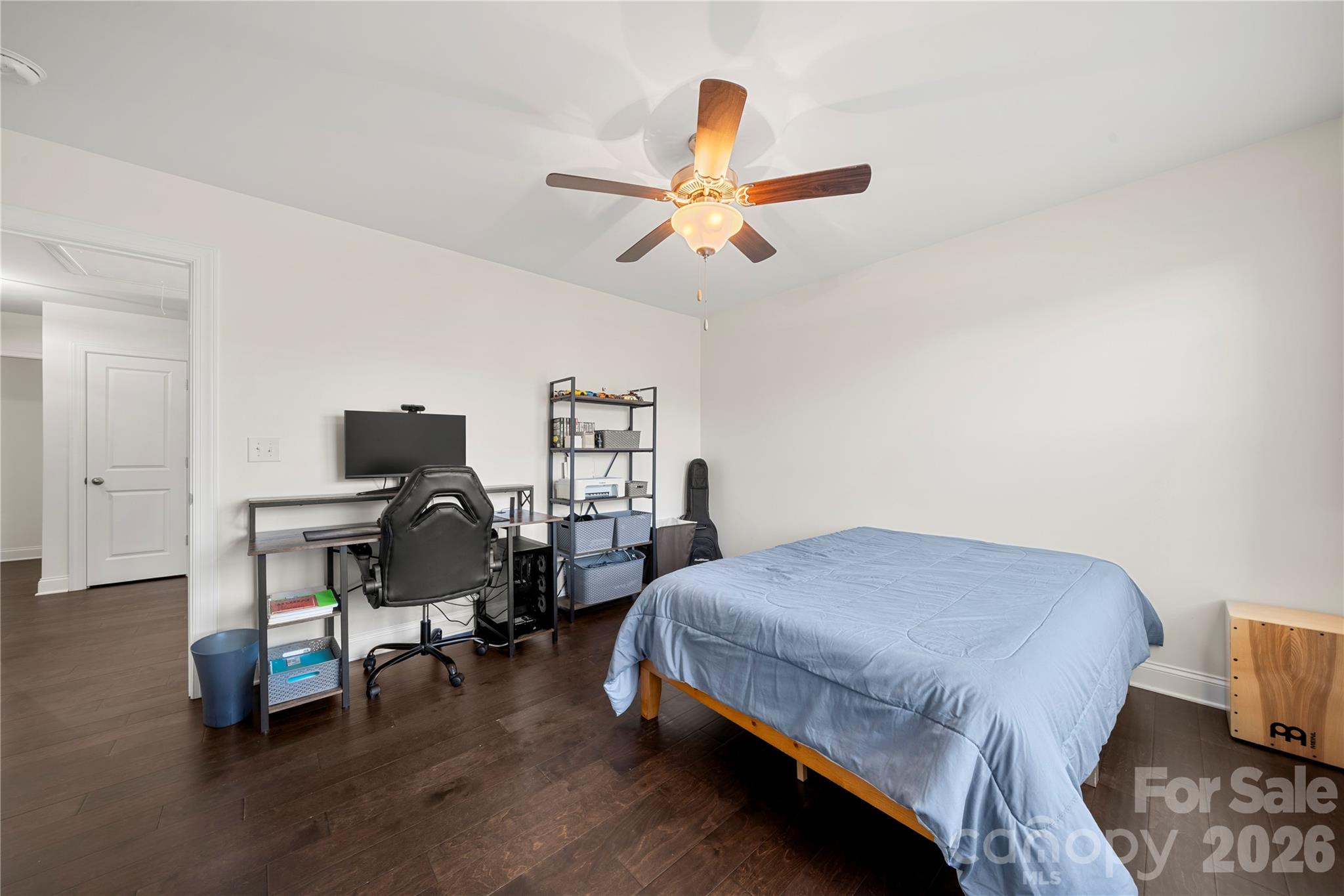 11266 Trailside Road Concord, NC 28027 - Photo 30 of 48 a bedroom with a bed and a chair