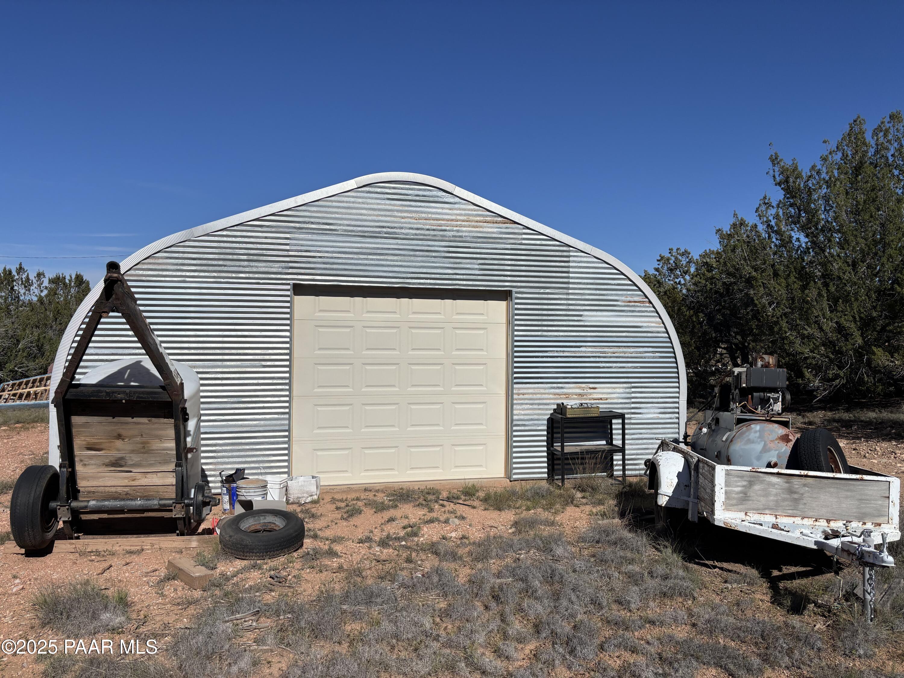 0 Basconia Lane Seligman, AZ 86337 - Photo 22 of 28 a backyard of a house with seating space