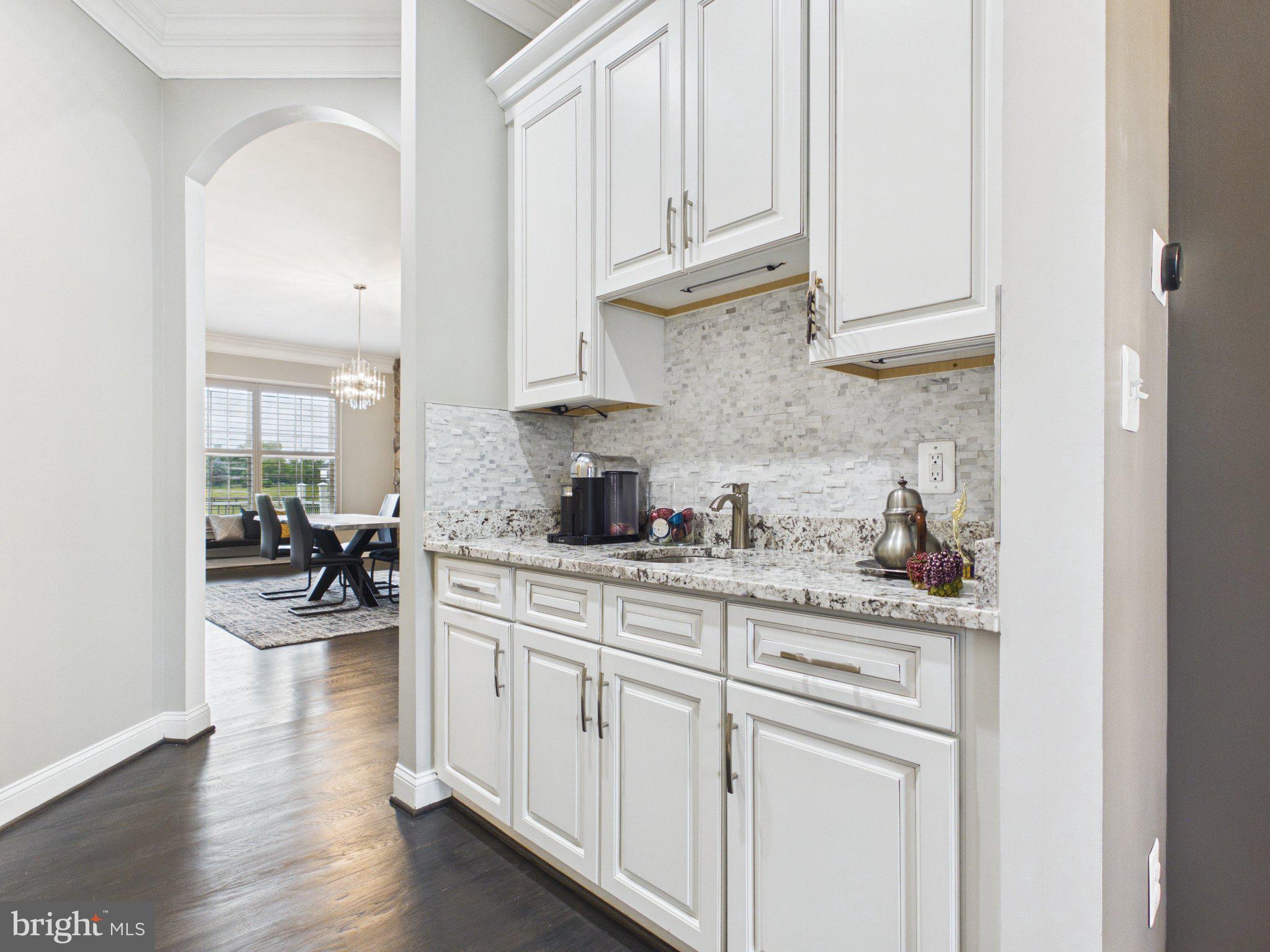 38565 Piggott Bottom Road Hamilton, VA 20158 - Photo 9 of 85 a kitchen with stainless steel appliances granite countertop white cabinets and a refrigerator