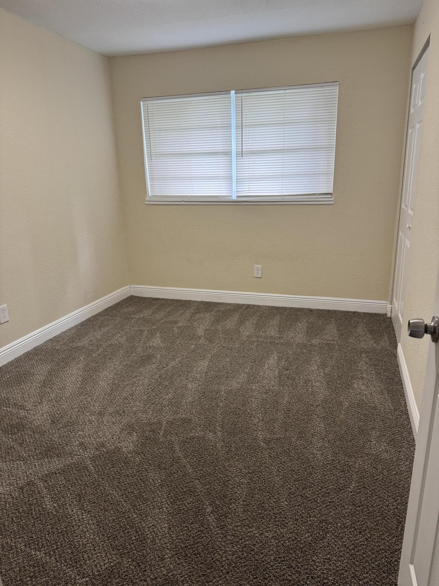 1604 Southeast Apache Avenue Stuart, FL 34994 - Photo 5 of 12 a view of an empty room