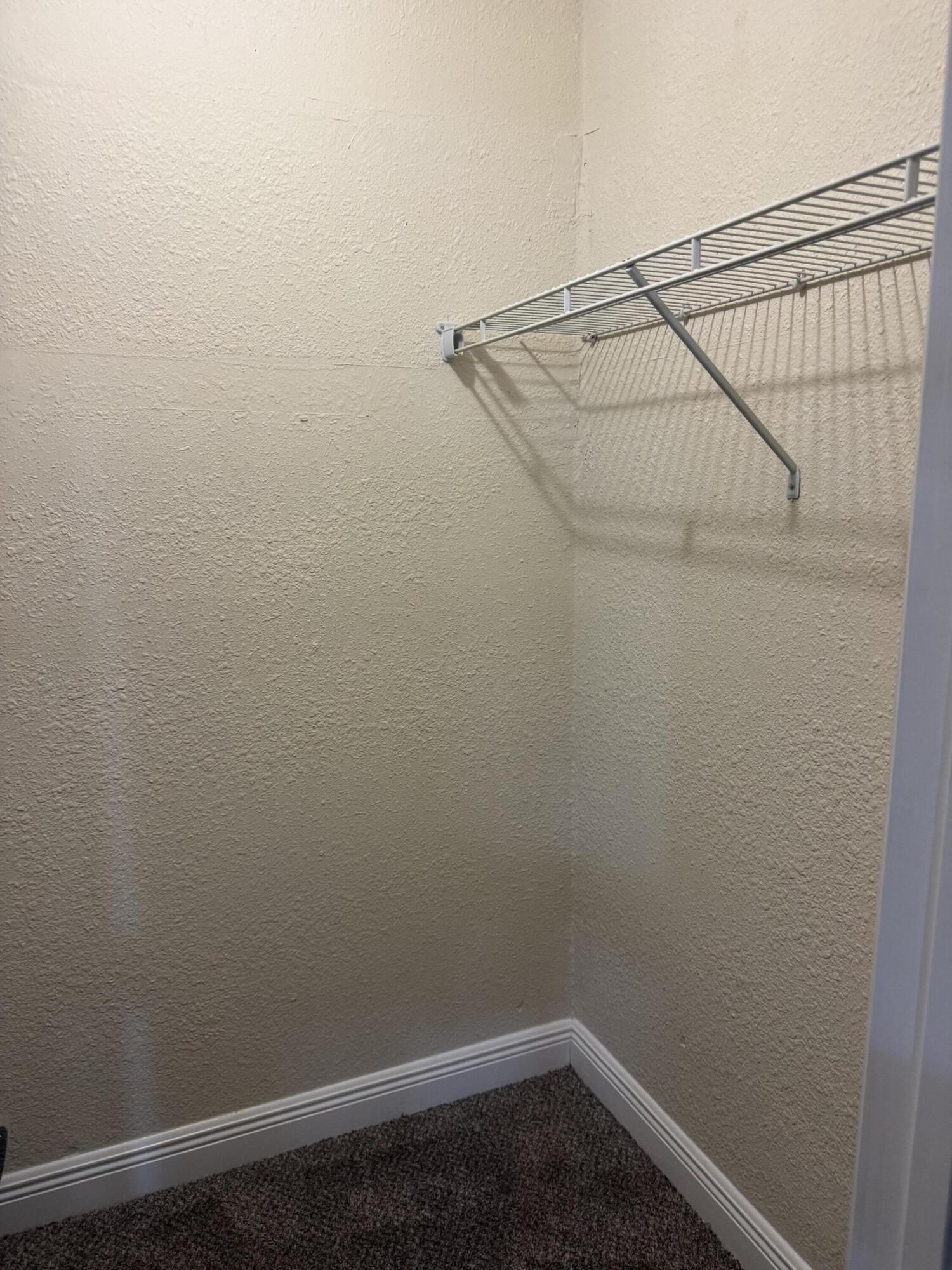 1604 Southeast Apache Avenue Stuart, FL 34994 - Photo 9 of 12 a view of small space with racks on the wall