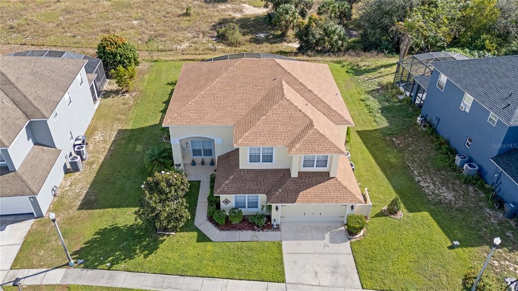 723 Wildflower Road Davenport, FL 33837 - Photo 2 of 34 an aerial view of a house