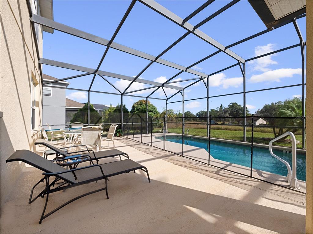 723 Wildflower Road Davenport, FL 33837 - Photo 29 of 34 a view of a terrace with couch