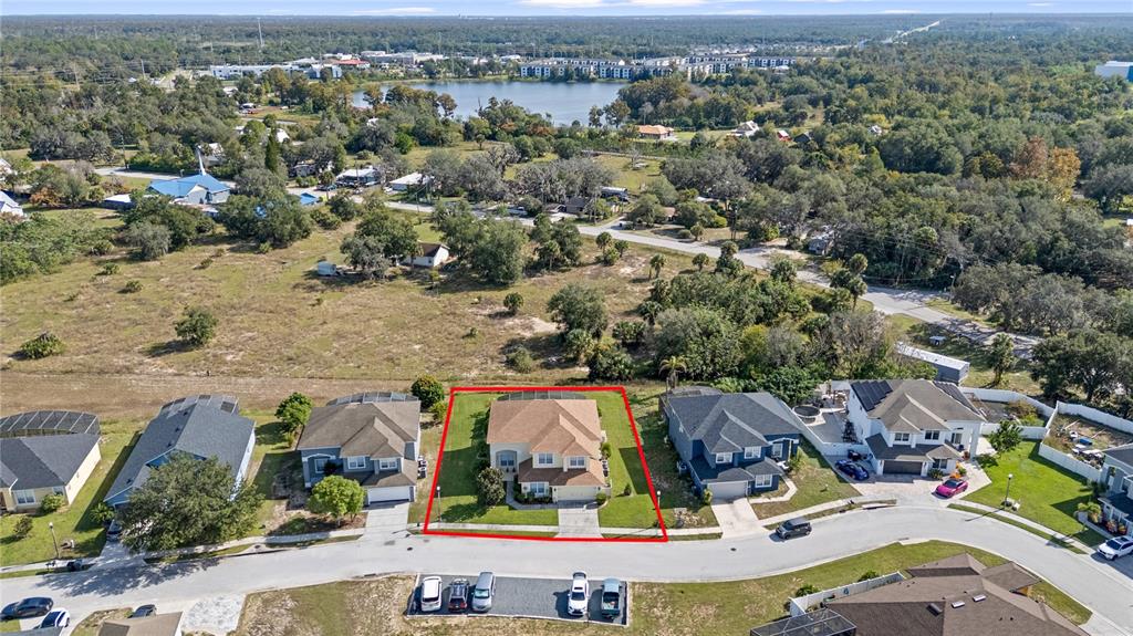 723 Wildflower Road Davenport, FL 33837 - Photo 33 of 34 an aerial view of residential house with outdoor space