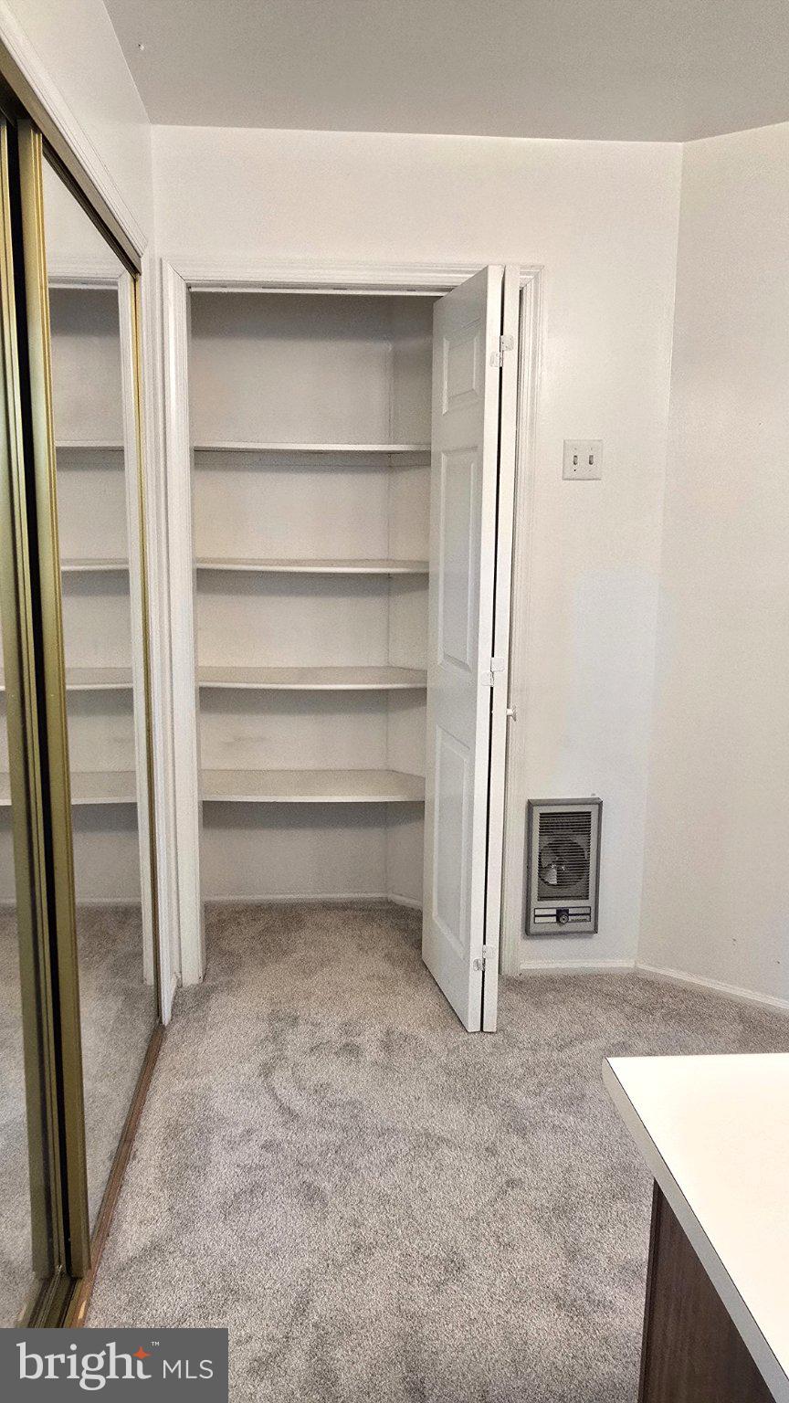 32 Sycamore Access Road Manahawkin, NJ 08050 - Photo 13 of 19 Spacious closet with organized shelves.