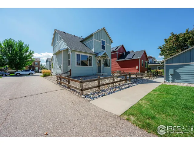 a house view with a outdoor space and sitting area