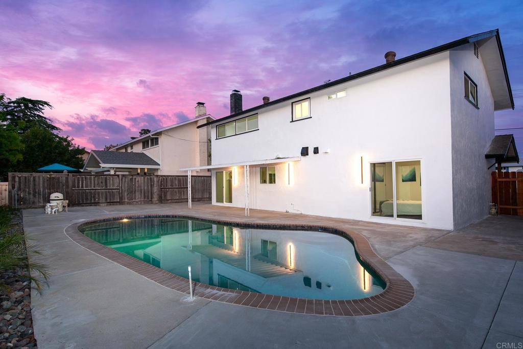 6802 Maury Drive San Diego, CA 92119 - Photo 33 of 44 a front view of house with yard