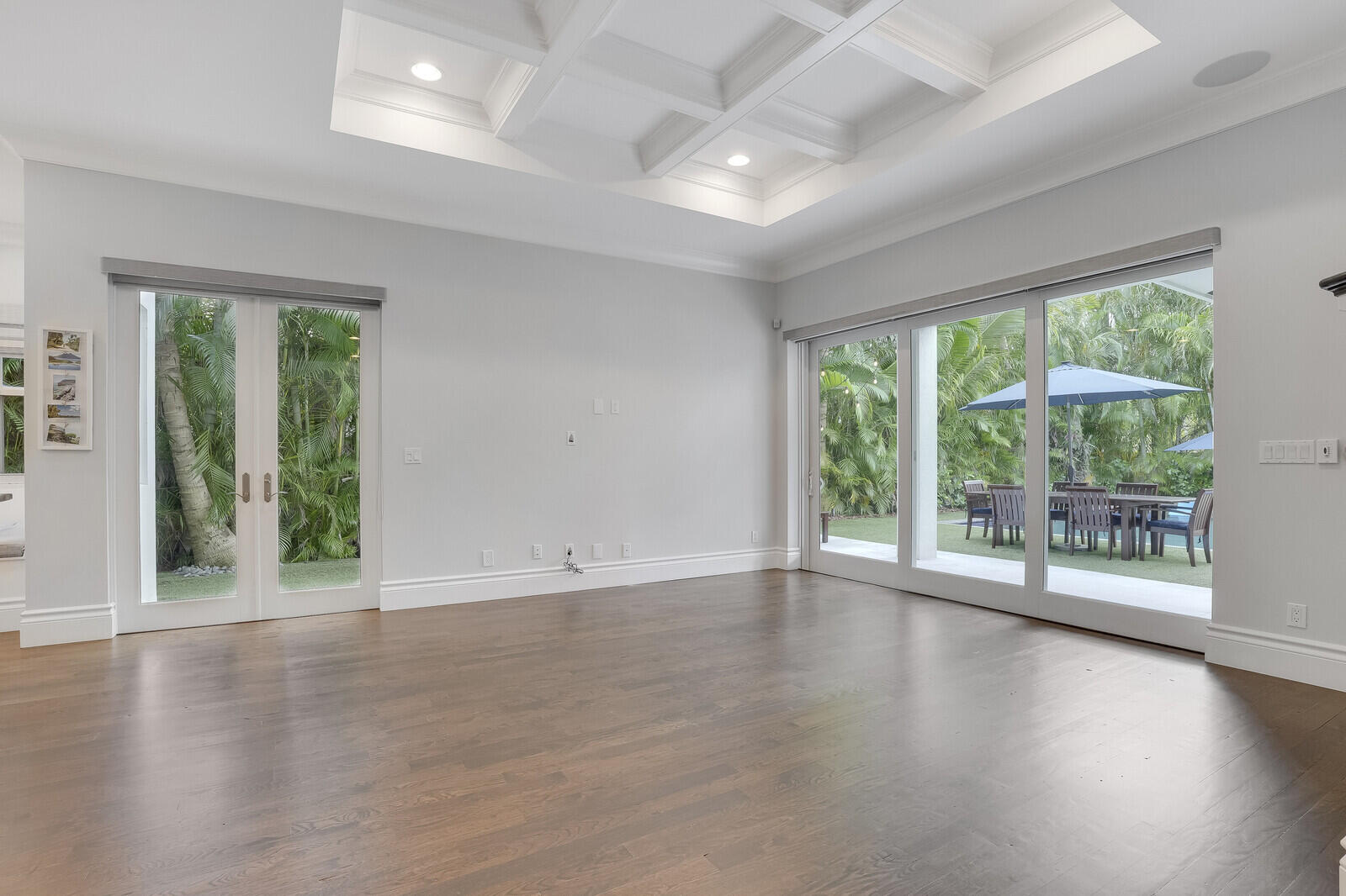 200 Northwest 10th Street Boca Raton, FL 33432 - Photo 20 of 76 a view of an empty room with wooden floor and a window