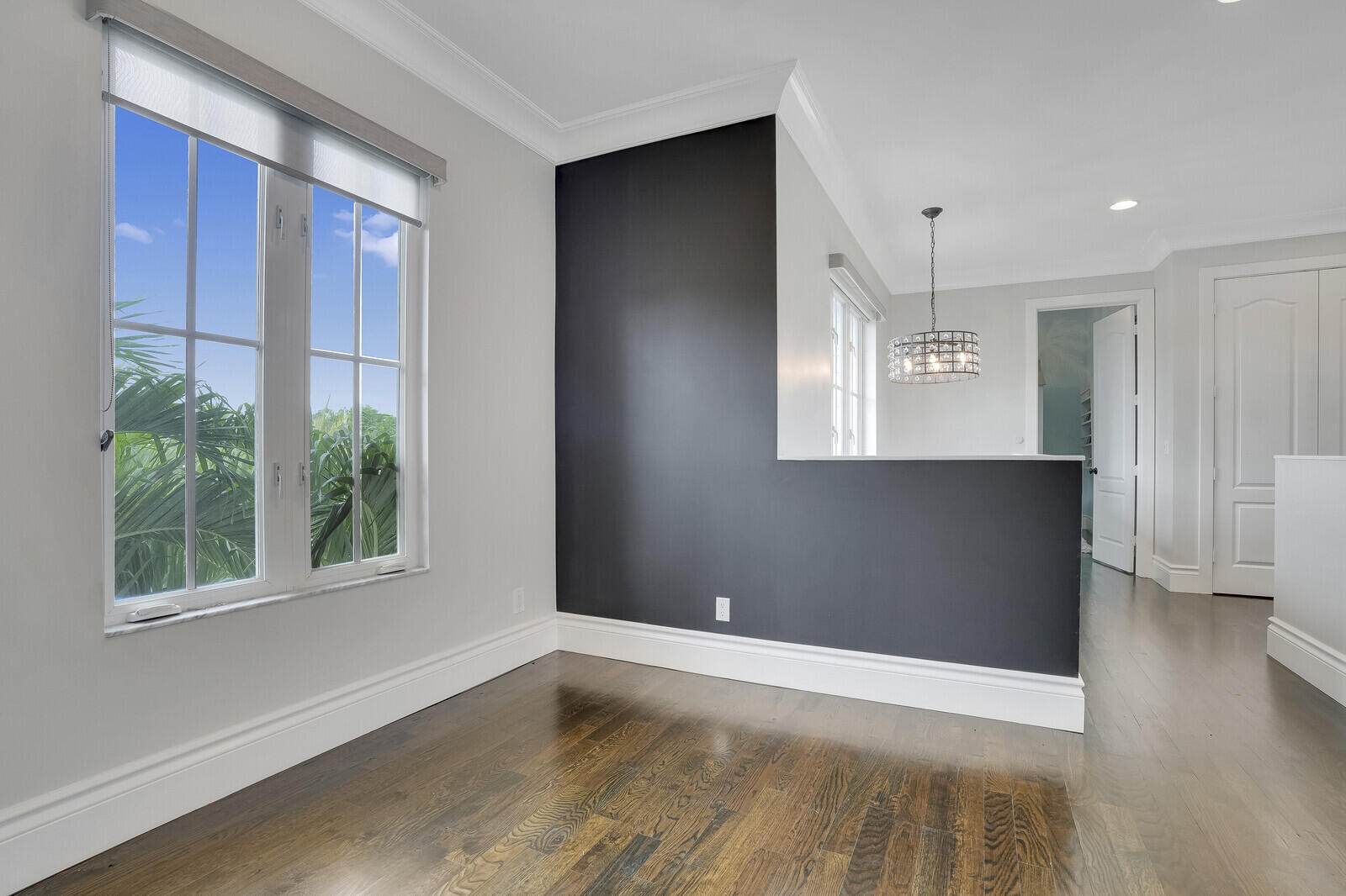 200 Northwest 10th Street Boca Raton, FL 33432 - Photo 25 of 76 an empty room with wooden floor and windows