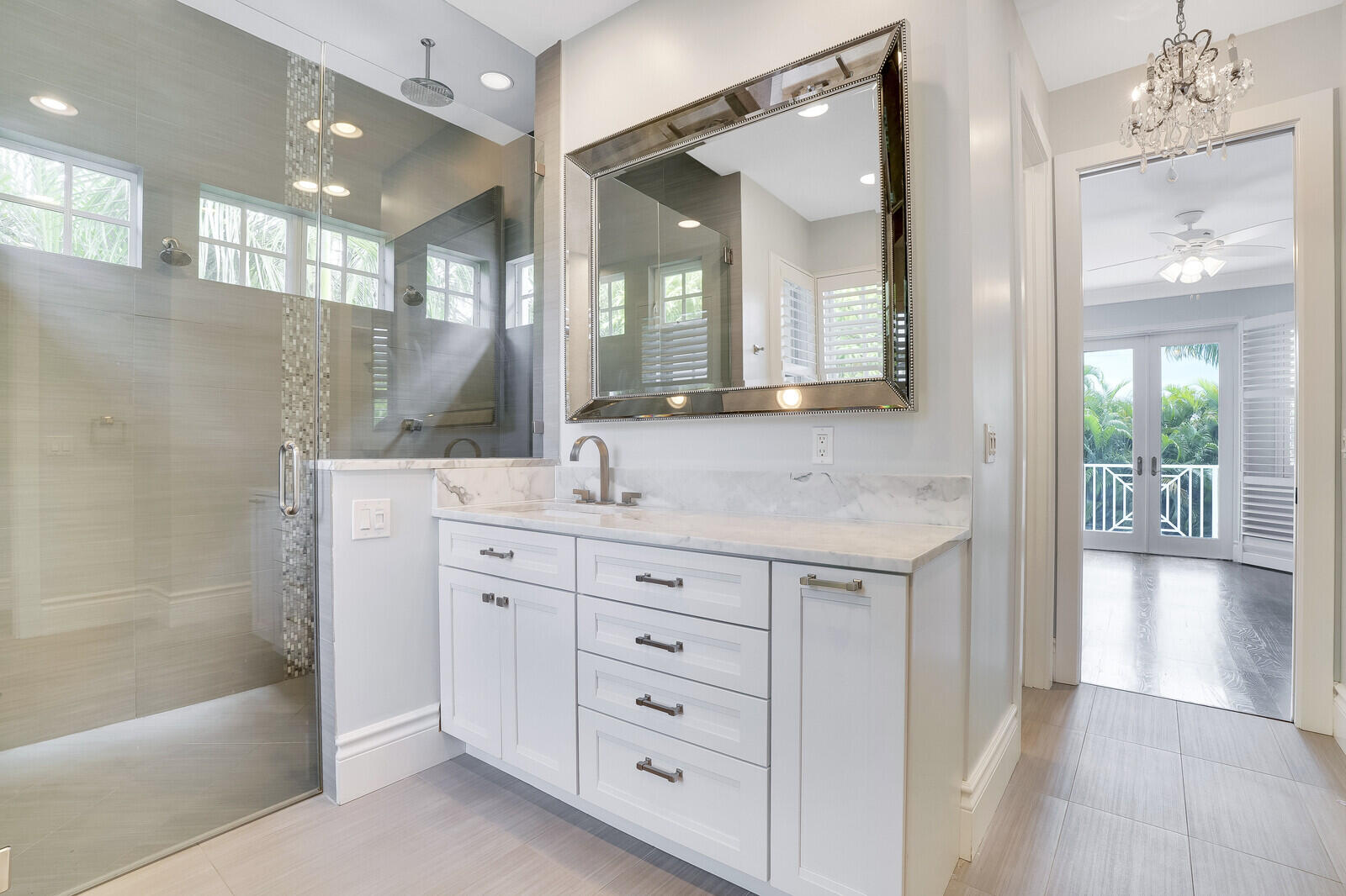 200 Northwest 10th Street Boca Raton, FL 33432 - Photo 35 of 76 a bathroom with a double vanity sink mirror and shower