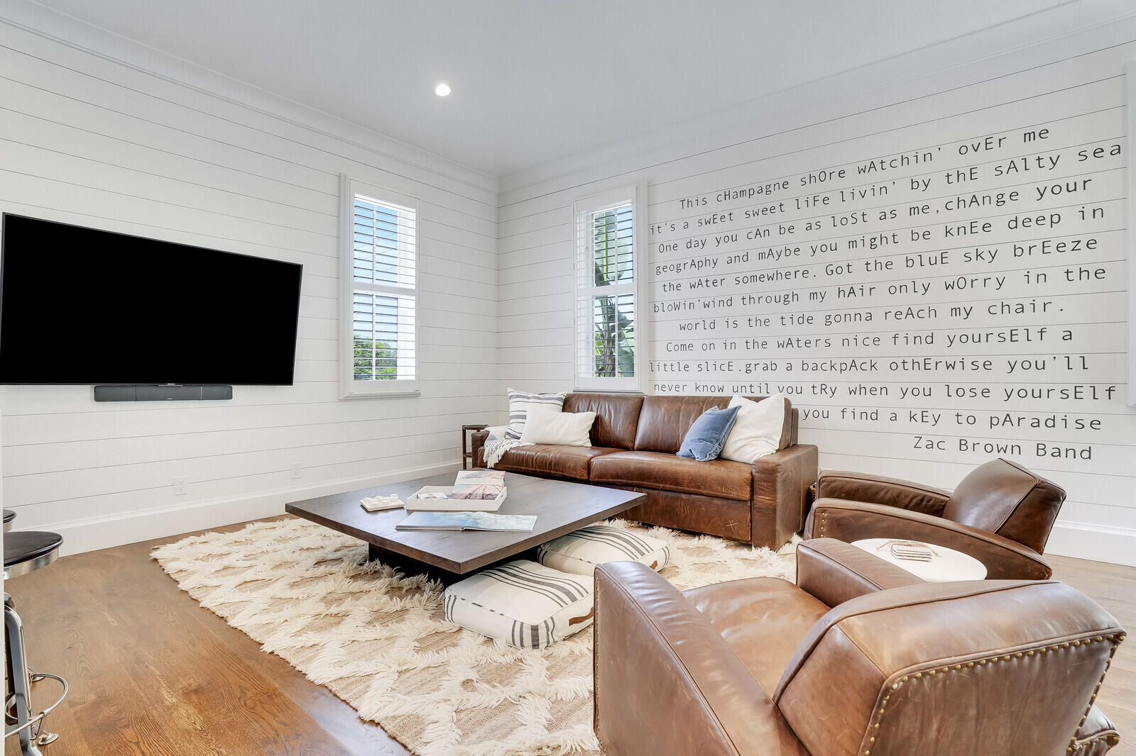 200 Northwest 10th Street Boca Raton, FL 33432 - Photo 40 of 76 a living room with furniture and a flat screen tv