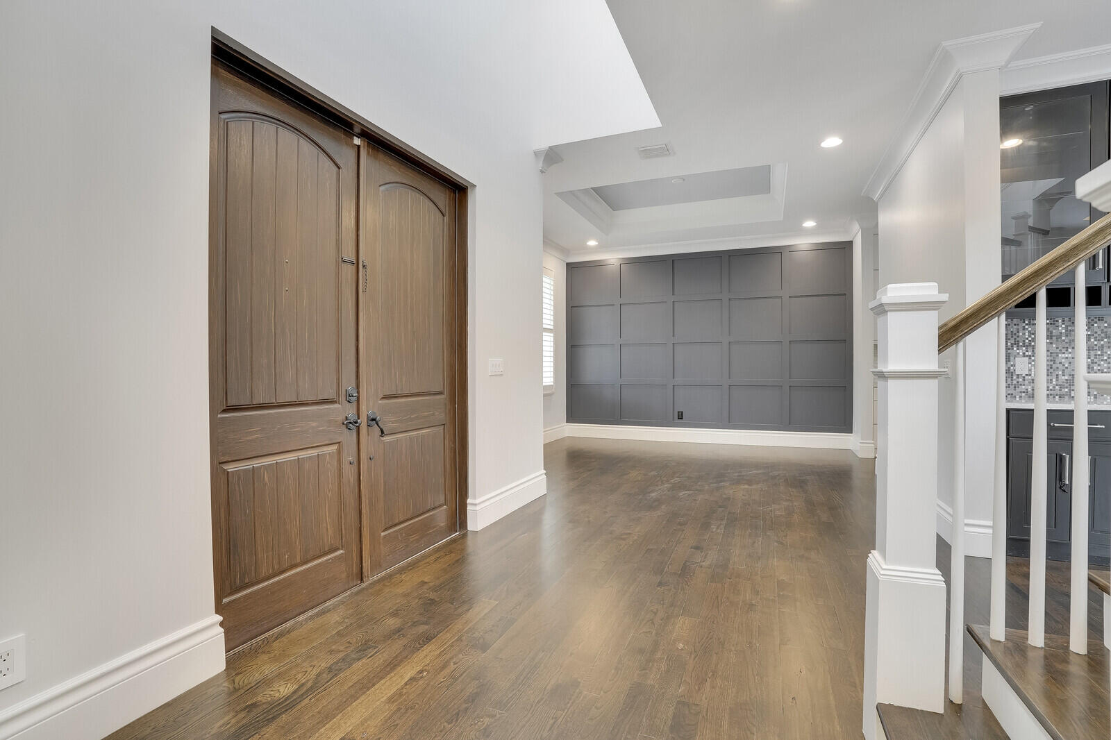 200 Northwest 10th Street Boca Raton, FL 33432 - Photo 4 of 76 an empty room with wooden door and entryway