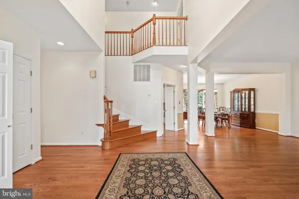 a view of entryway with wooden floor