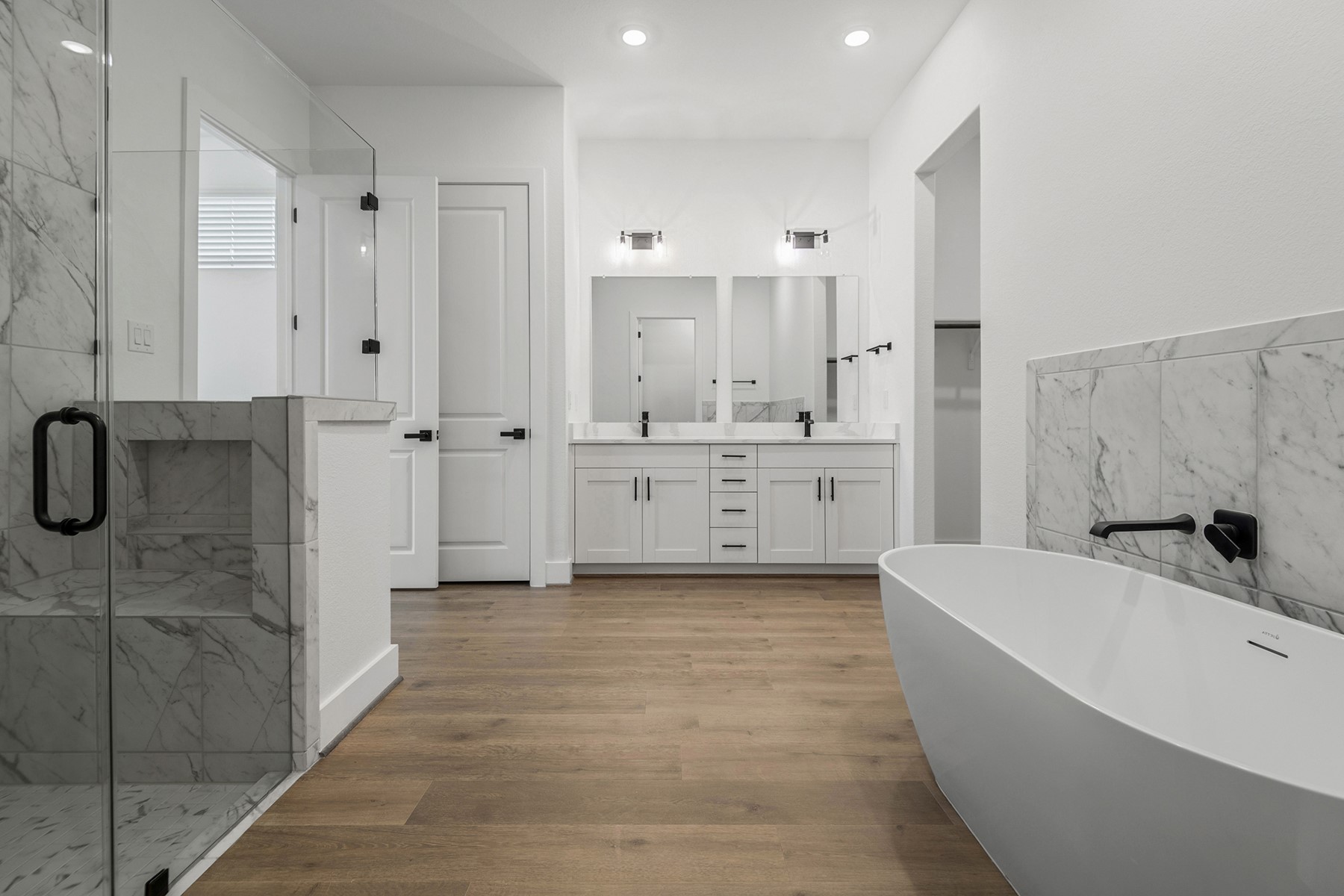 1809 Drover Lane Rosenberg, TX 77471 - Photo 16 of 21 a large bathroom with a tub shower a sink and a mirror