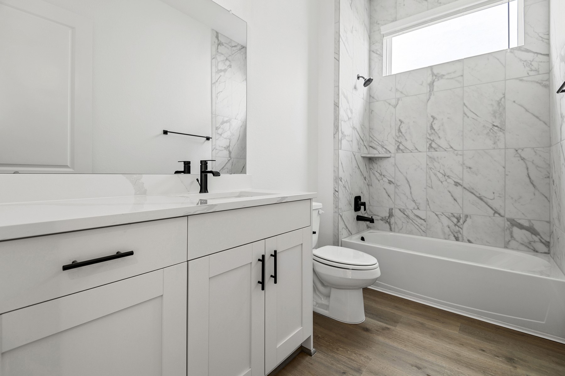 1809 Drover Lane Rosenberg, TX 77471 - Photo 21 of 21 a bathroom with a sink a toilet and shower