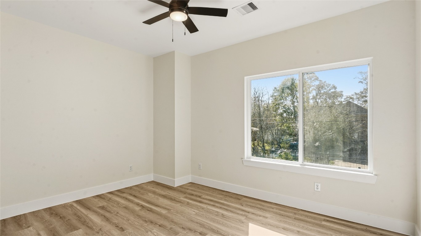 1315 Knight Street, Unit 2 Houston, TX 77022 - Photo 4 of 4 a view of room with window and ceiling fan