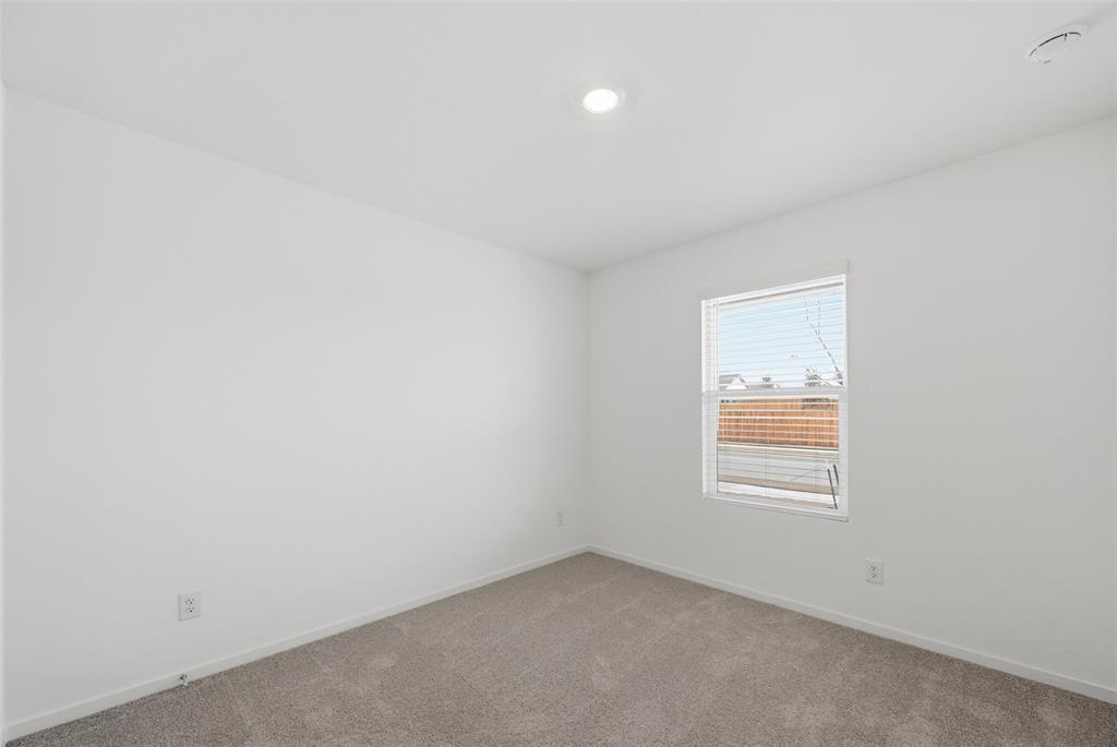 7709 Rutherford Lane McKinney, TX 75071 - Photo 14 of 23 an empty room with a window