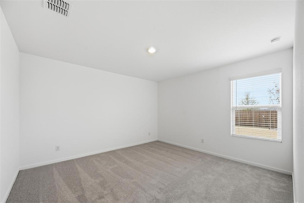 7709 Rutherford Lane McKinney, TX 75071 - Photo 9 of 23 an empty room with a window