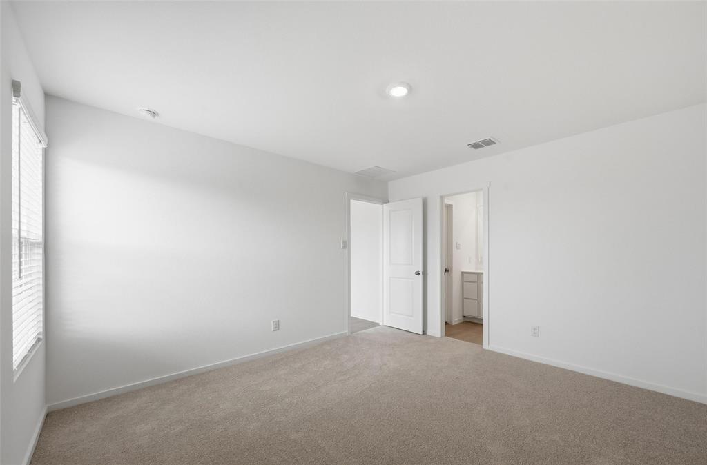 7709 Rutherford Lane McKinney, TX 75071 - Photo 10 of 23 a view of an empty room