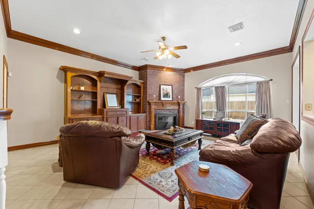 a living room with furniture and a window